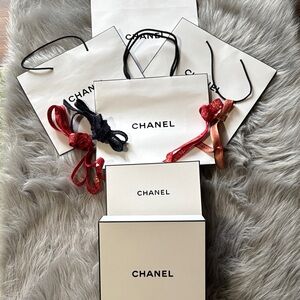 CHANEL White Shopping Bags & Boxes with Black Logo and Red and Blue Bows